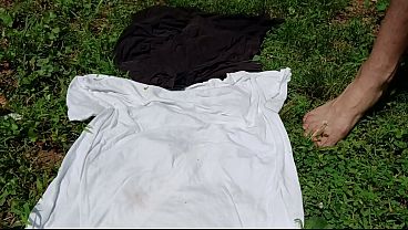 Big cock greased up spurting cum. Outside jerking off in plain sight laying in the grass. Cum ride this cock